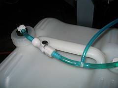 Elbow fitting, quick-disconnect and primer Tee-joint
