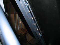 Throttle cable behind seat